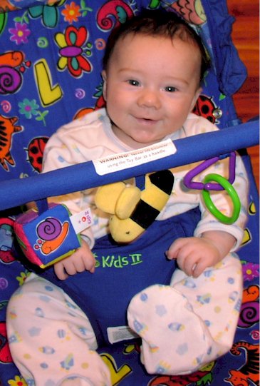 Smiling Antnony - He loves his bouncy chair.